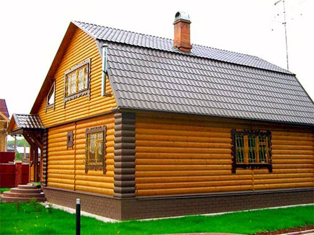 Отделка фасада частного деревянного дома